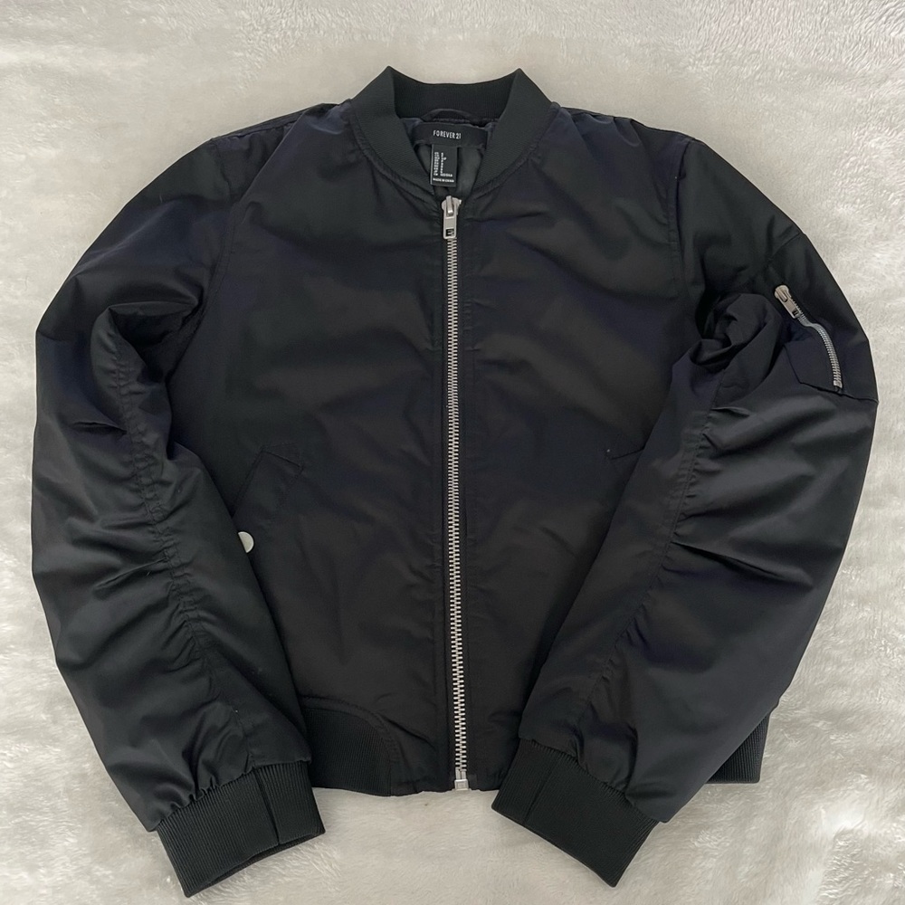 Size Small Forever 21 Black BomberJacket. In excellent condition. Like new!